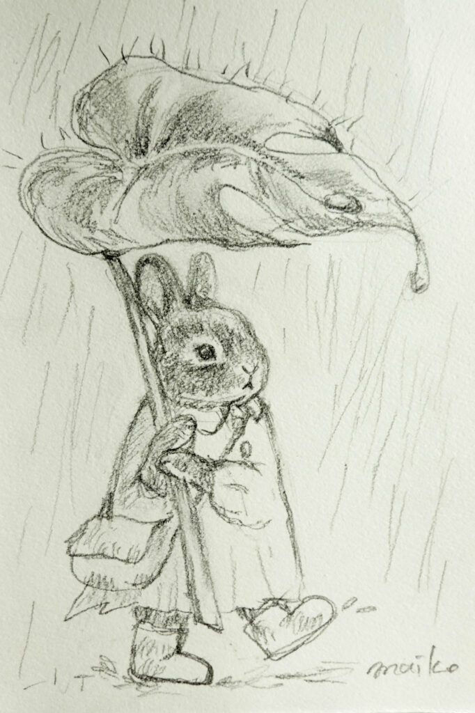 大きなクワズイモの葉を傘代わりにして雨の中を歩くうさぎの鉛筆画